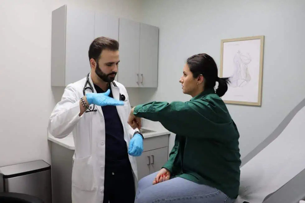 Doctor giving a patient an exam.