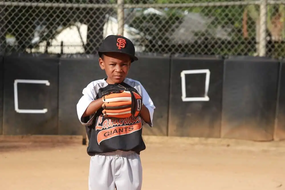 child playing baseball
